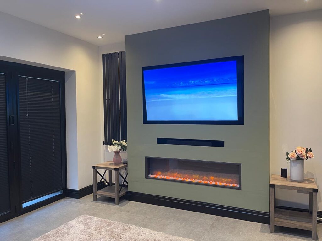 living room with a tv and electric fireplace